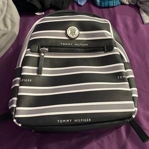 a cute tiny tommy Hilfiger backpack .
